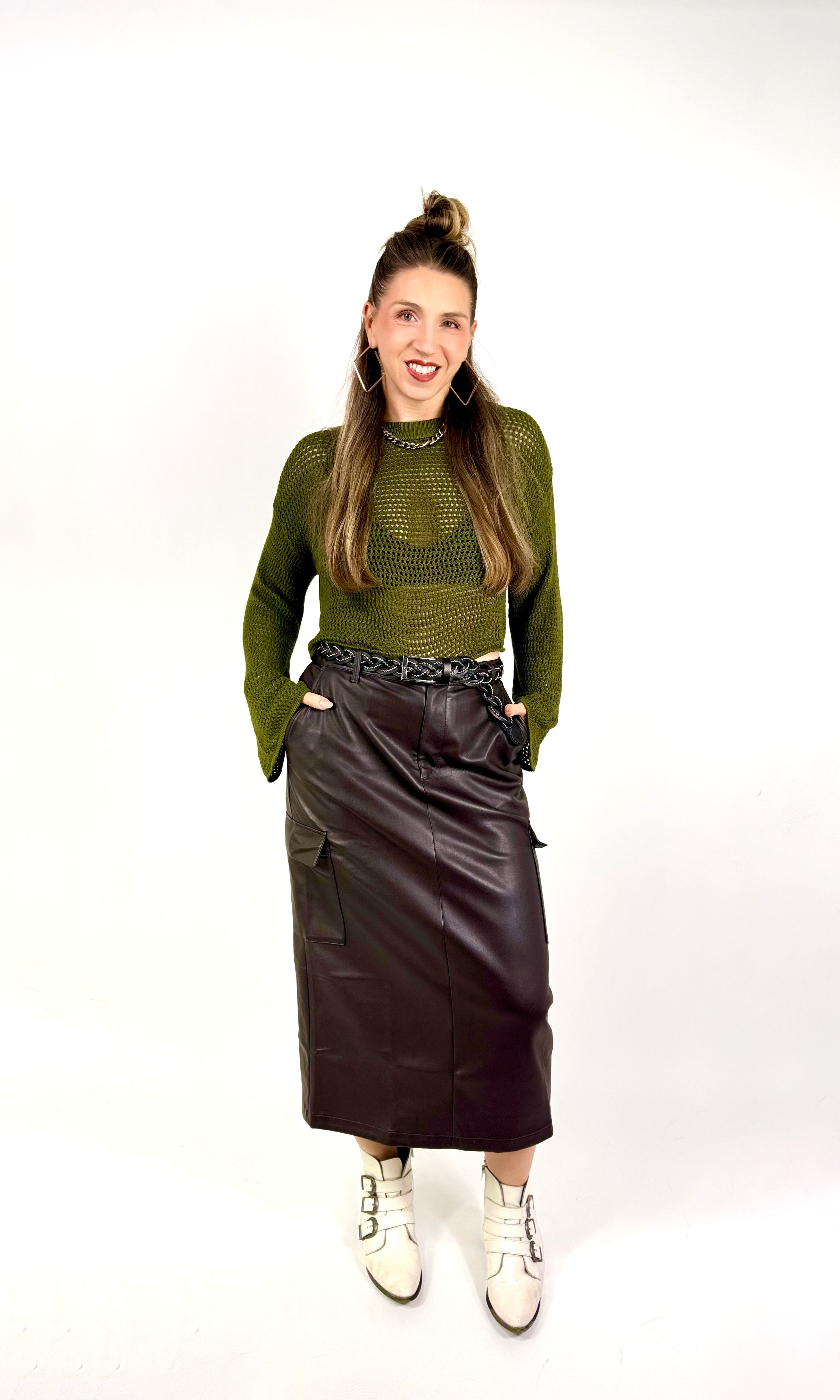 olive crochet style open knit sweater worn by woman gyal bashy