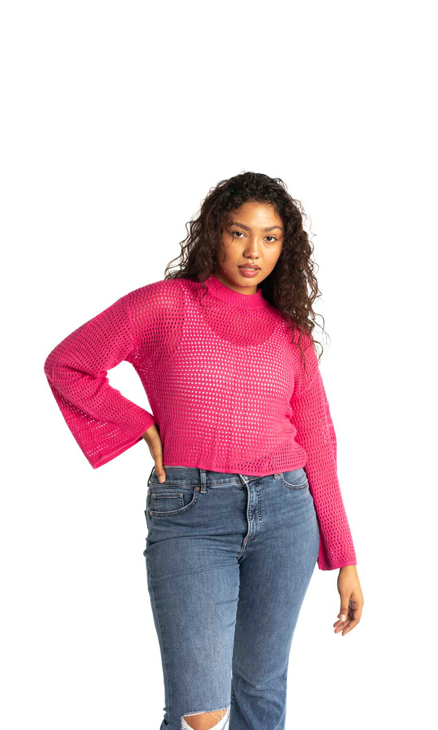 pink crochet style open knit sweater worn by woman gyal bashy