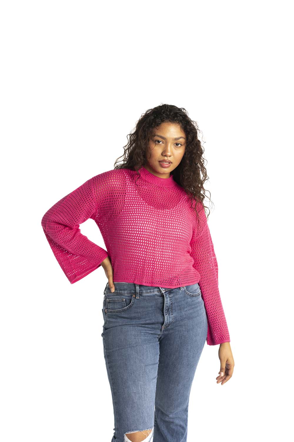 pink crochet style open knit sweater worn by woman gyal bashy