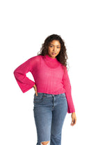 pink crochet style open knit sweater worn by woman gyal bashy