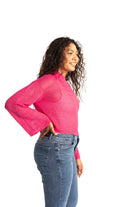 pink crochet style open knit sweater worn by woman gyal bashy