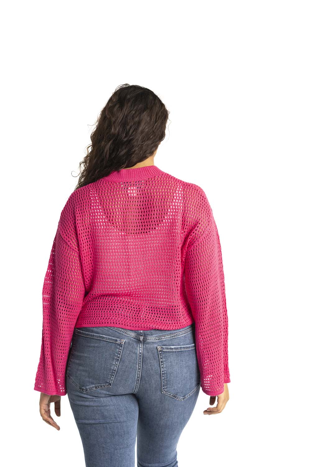 pink crochet style open knit sweater worn by woman gyal bashy