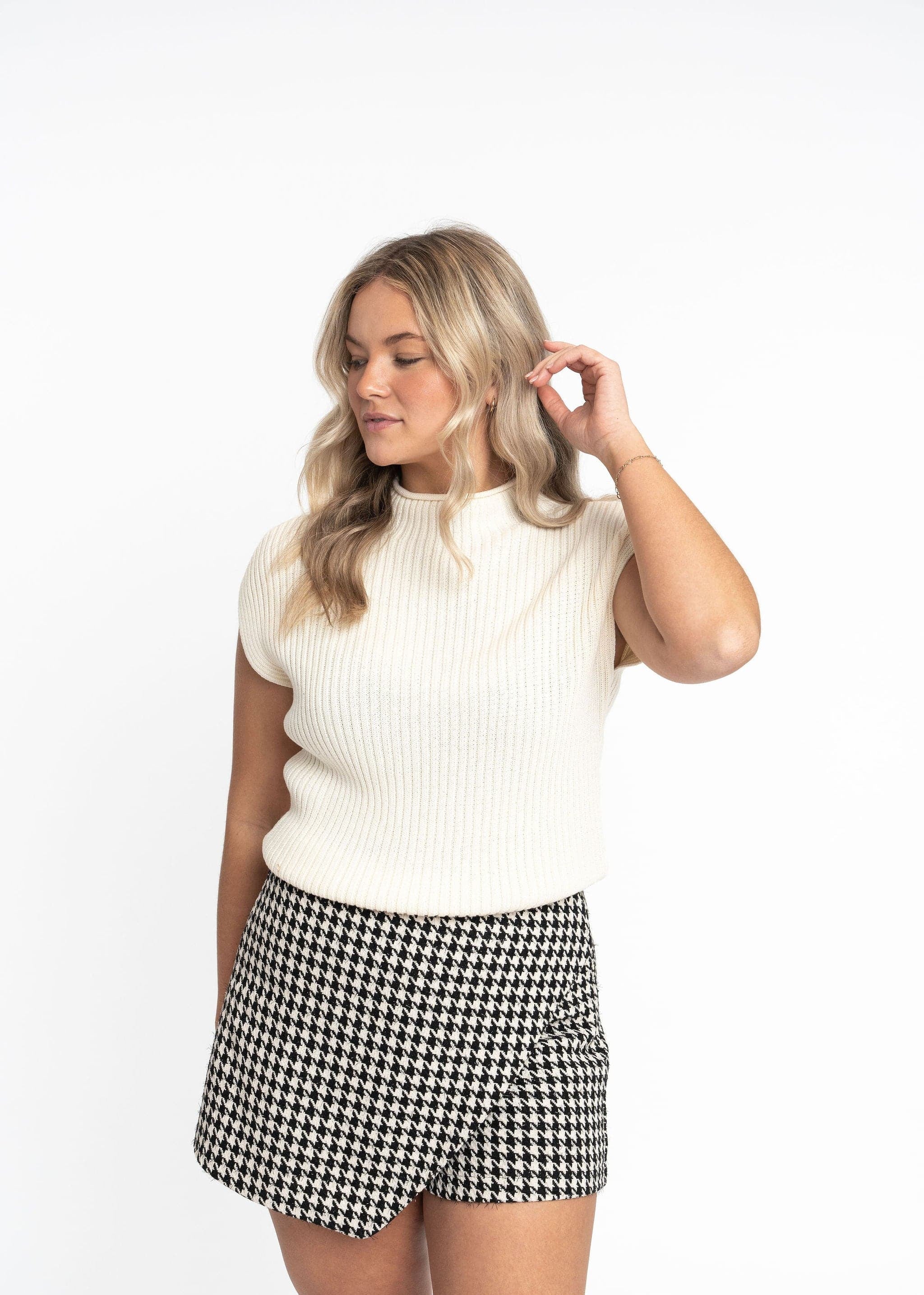 Angela: Sustainable Cap Sleeve Mock Neck Ribbed Sweater by Elaine Lewis GyalBashy