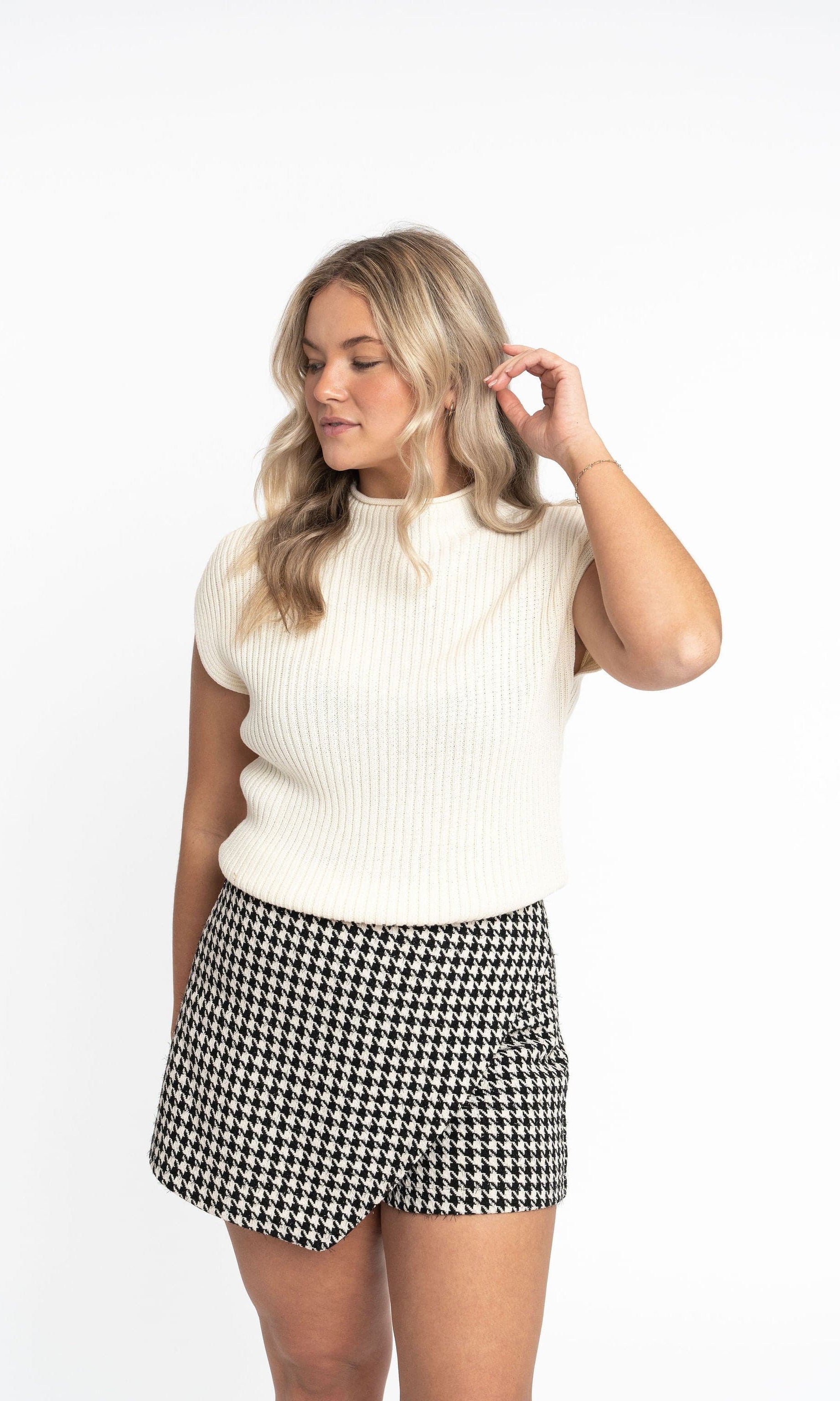 Angela: Sustainable Cap Sleeve Mock Neck Ribbed Sweater by Elaine Lewis GyalBashy
